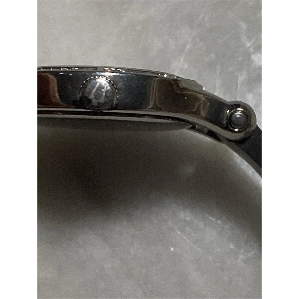 Bulova Women Silver Tone Crystal Bezel Mother Of Pearl Dial Bangle Watch C869915